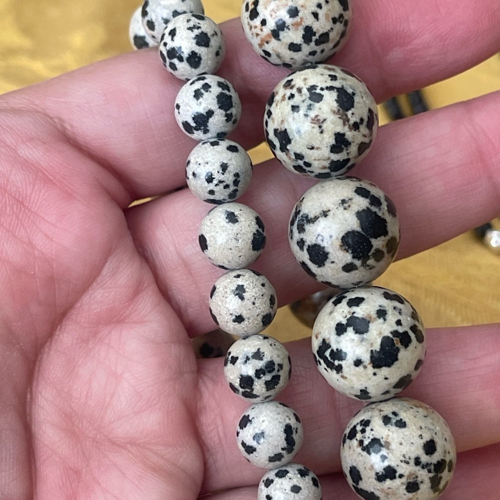 Metas- 2 Dalmatian stone bracelets different size beads